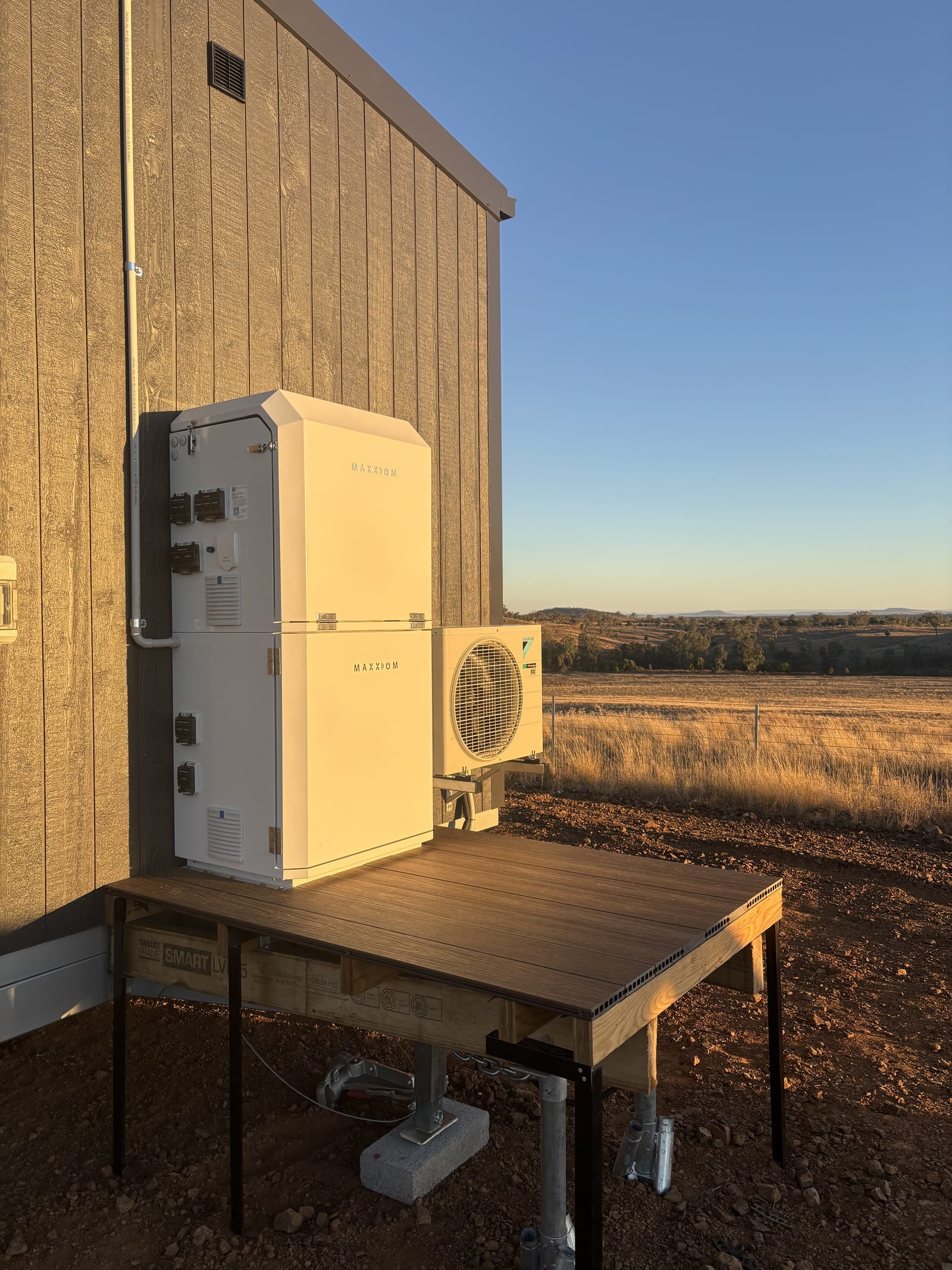 Maxxiom Power Box installed on a rural property at sunset